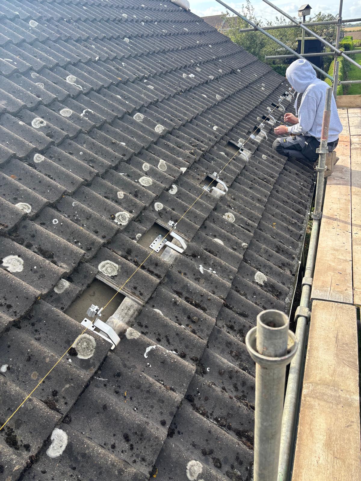 Fitting Roof Brackets by RJ Hill Electrical, Lincolnshire